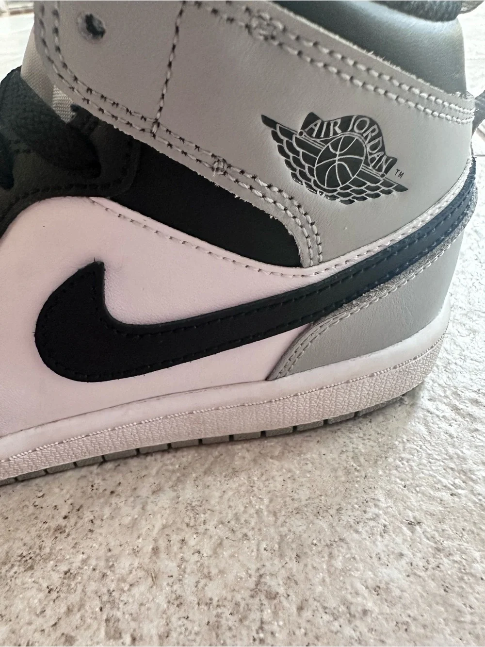 Air Jordan 1 Kids Black and White Low-Top Sneakers